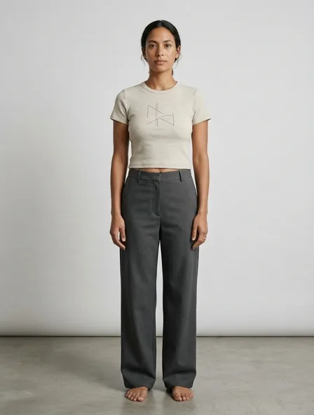 Minimalist crop top on a model: clean lines, neutral colors, simple silhouettes