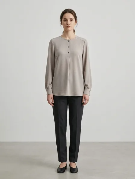 Blouse in polyester crepe, on a model in a studio
