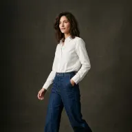 A garment photo as a visitor might upload it: white shirt and wide-leg denim